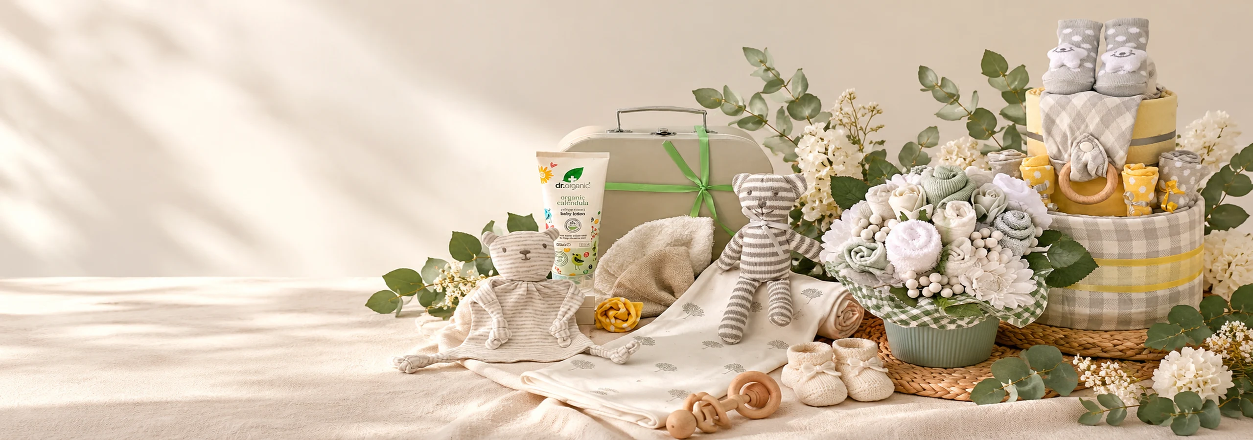 Baby shower gifts with nappy cake, baby bouquet and newborn gifts